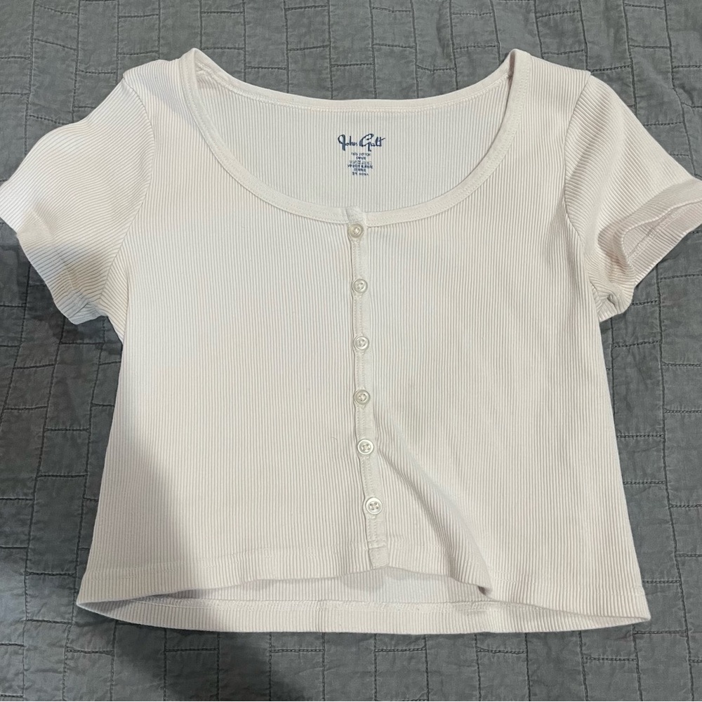 John Galt light pink baby tee